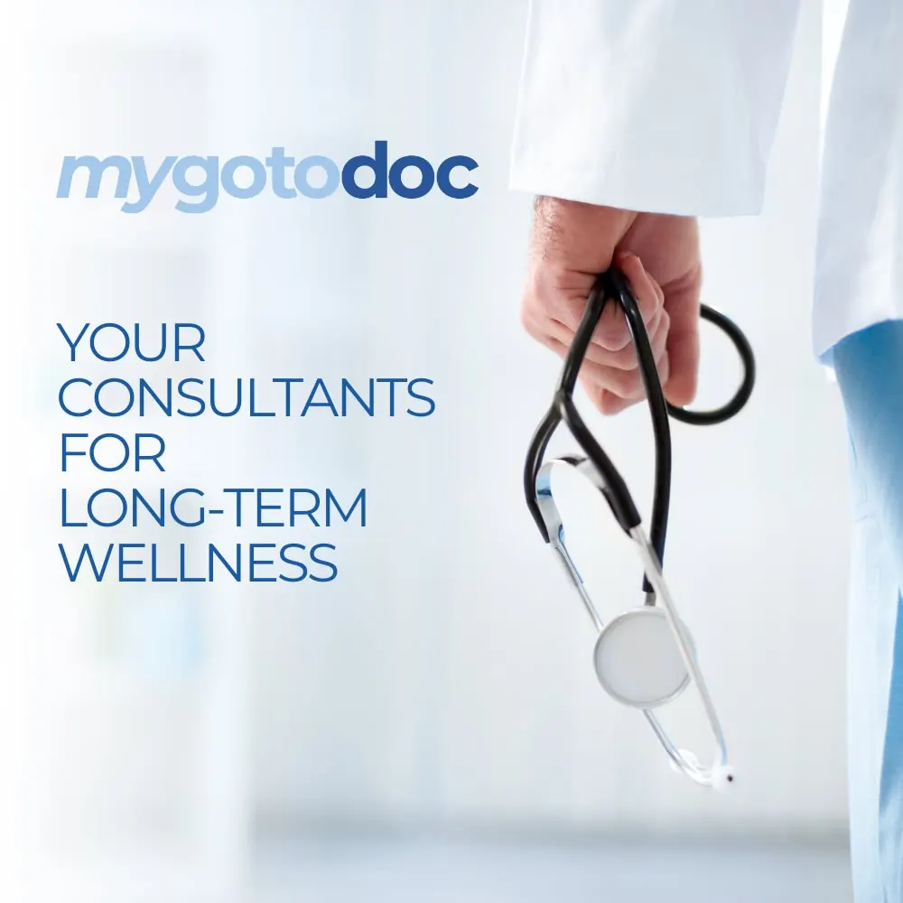 MyGoToDoc, doctor hand holding stethoscope with wellness headline
